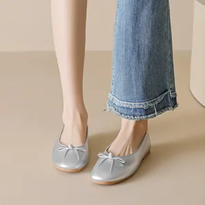 Elegant silver bow ballet flats for women with soft soles and metallic finish