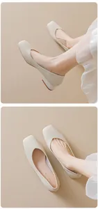 Detail view of beige square-toe pumps with chunky low heels and V-cut design