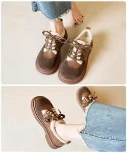 Detail of retro platform lace-up leather shoes with thick faux fur lining for winter warmth