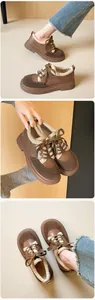 Detail of retro platform winter shoes showing warm faux fur lining and brown leather texture