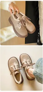 Detail of warm beige platform loafers with thick plush lining and durable rubber soles