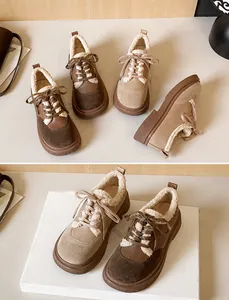 Detailed close-up of warm platform sneakers with plush lining and dual-tone stitching