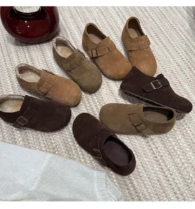Collection of suede leather mule clogs in various brown tones with soft warm lining