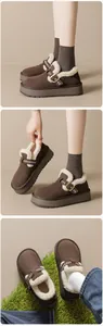 Detail of plush lining and metal buckle on dark brown platform suede winter mule shoes