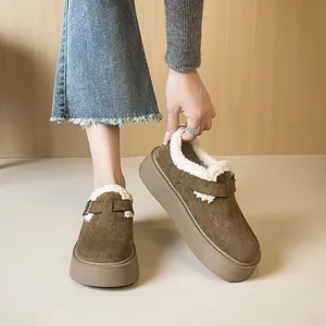 Women's brown platform suede boots with faux fur lining and metal buckle accent