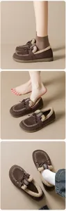 Détails des mocassins en daim marron foncé avec doublure en peau de mouton et broderies