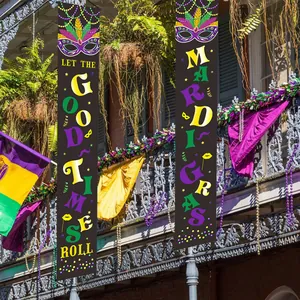 Dettaglio degli striscioni Mardi Gras con maschere di Carnevale e motivi viola e dorati