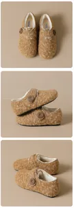 Detailansicht brauner Plüschschuhe mit weißem Lammfellfutter und dekorativem Holzknopf