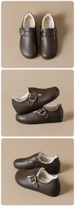 Détail de sabots Birkenstock marron avec doublure en fourrure pelucheuse et boucle en métal