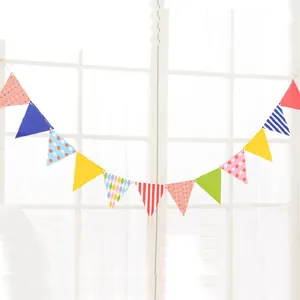 Cartoon rocking horse pennant banner with colorful stripes and polka dots for baby party