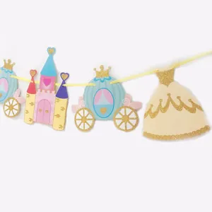Detail of glitter princess castle party banner with blue carriage and pink dress