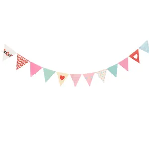 Pastel triangular paper bunting with heart and stripe patterns for baby birthday decor