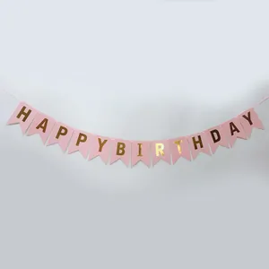 Detailed view of pink swallowtail banner with gold foil Happy Birthday letters
