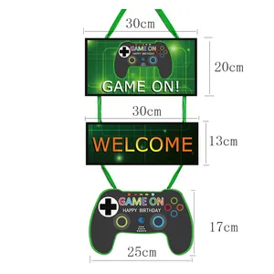 Game on birthday party banner set with gamepad hanger and dimensions in green and black