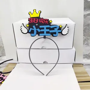 Close-up of birthday headband with colorful felt crown and wings for kids party
