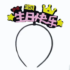 Close-up of pink Happy Birthday headband with felt stars and crowns for girls