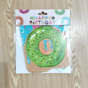Packaged donut themed Happy Birthday banner and paper garland party decorations