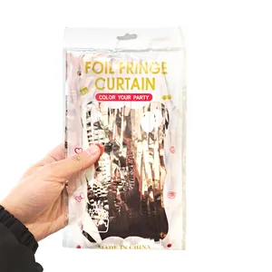 Close-up of rose gold foil fringe curtain in clear self-adhesive party packaging