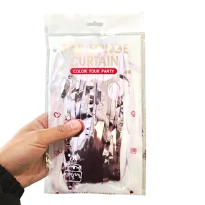 Foil fringe curtain in light purple metallic finish packaged in clear plastic display bag