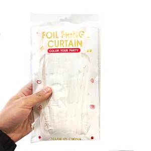 White foil fringe curtain party decoration in retail packaging with party graphics