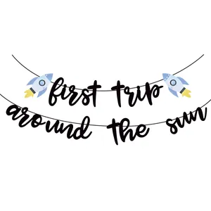 First Trip Around the Sun birthday banner with blue rockets for space themed parties
