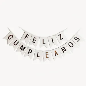 Spanish Feliz Cumpleaños birthday banner with gold foil letters on white cardstock bunting