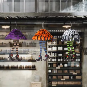 Halloween witch leg honeycomb paper decorations with striped socks and pointy shoes