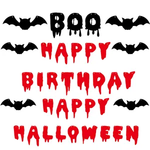 Detail of red glitter Happy Birthday banner with dripping blood font and black bats silhouettes