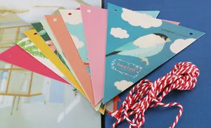 Close-up of colorful heart and polka dot party bunting with cotton string for kids birthdays