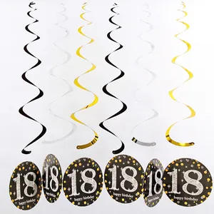 Golden and silver 18th birthday celebration swirls with happy birthday hanging cards