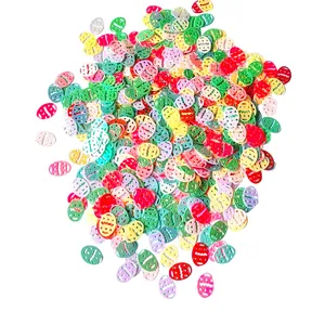 Close-up of colorful Easter egg confetti with cutout patterns for DIY party decor