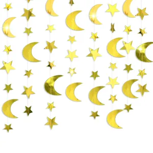 Golden stars and moons hanging garland for festive holiday party and home wall decoration