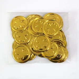 Golden plastic coins with shamrock patterns for St. Patrick's Day party decorations