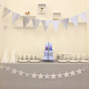 Silver party set with chevron banners, pointed hats, cups and 3-tier cake stand