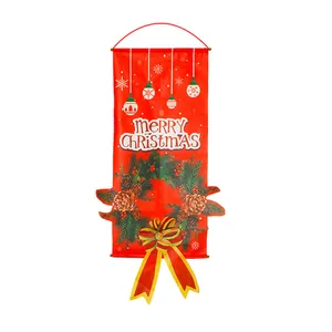 Close-up of Merry Christmas vertical banner with evergreen wreath and red bow decoration