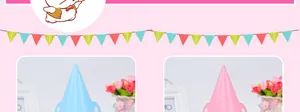 Dettaglio di cappellini da festa a pois rosa e blu con graziose orecchie per compleanni bimbi