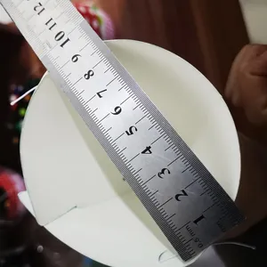 Close-up measurement of the 9cm top opening diameter on the mini party cone hat