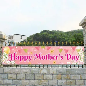 Pink Mother's Day outdoor banner with daisies and balloons on a stone fence backdrop