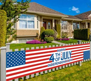 Detail of Happy 4th of July Independence Day banner on outdoor garden fence