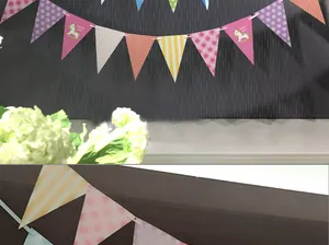 Detail of colorful party bunting flags with polka dots, stripes and rocking horse patterns