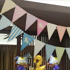 Blue and pink rocking horse bunting banners and balloons for kids' birthday party decor