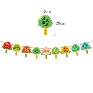Close-up of Dragon Boat Festival hanging banners with zongzi shape and colorful patterns