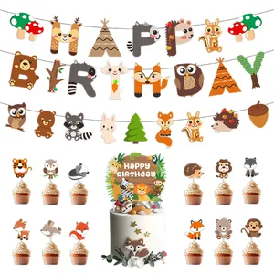 Close-up of forest animal Happy Birthday banner and woodland creatures cupcake toppers