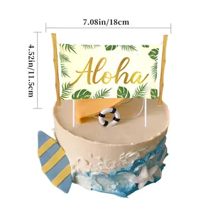 Aloha cake topper with tropical palm leaves on a decorated ocean-themed cake