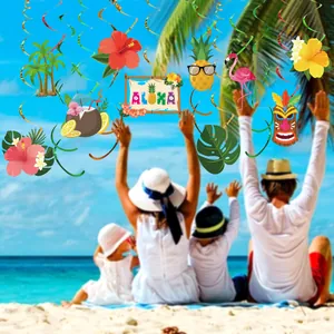 Detail of Hawaii luau party hanging swirls with flamingo, pineapple, and Tiki mask designs