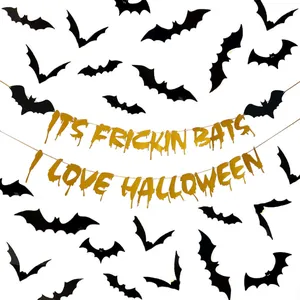 Halloween decoration set featuring black bats and gold glittery letters on a white background