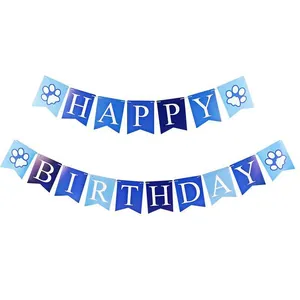 Banderole Happy Birthday bleue pour chiens avec motifs de pattes sur fond blanc pur