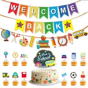 Detailed view of Back to School party kit with paper banners and cake toppers