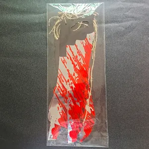 Detailed view of bloody knife and saw banner set for Halloween party decoration
