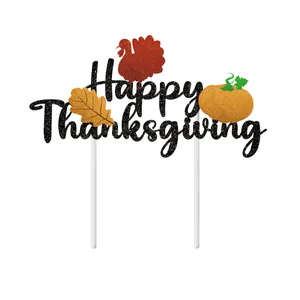 Happy Thanksgiving cake topper with black glitter text, turkey, maple leaf, and pumpkin decor